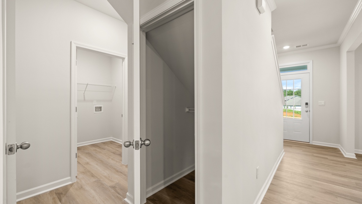 Interior upstairs loft area with hall closet