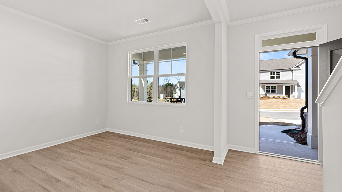 View of the flex room with a double window and the entrance.