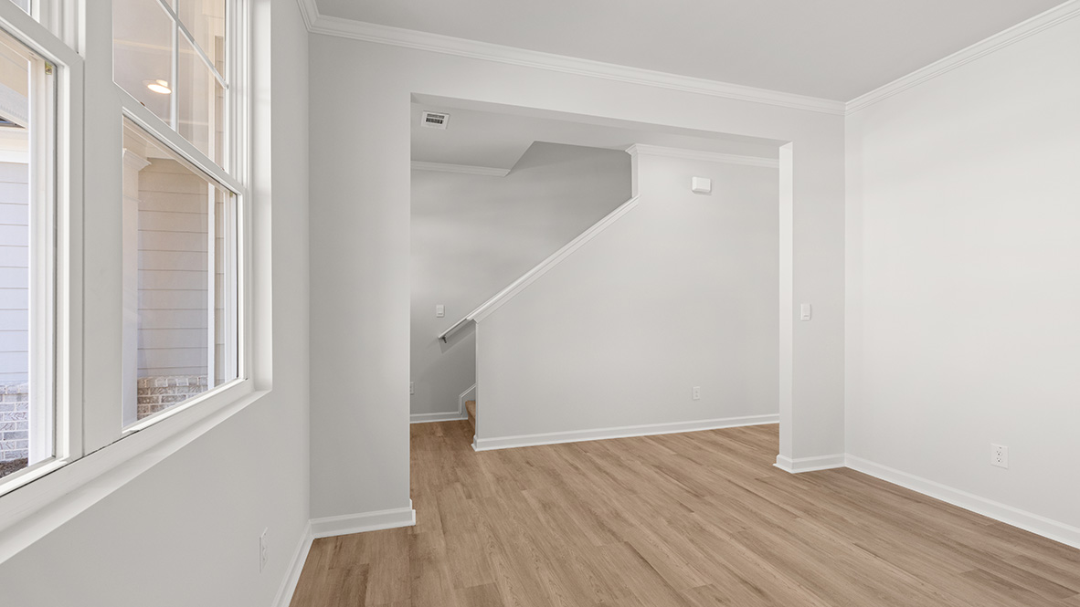 Flex room view of the stairs and entrance.