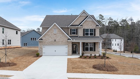 Butner Estates community two story home with brick elevation
