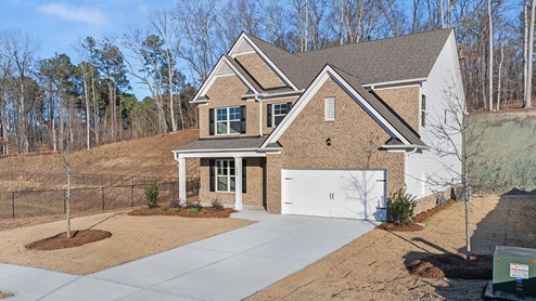 Butner Estates community two story home with brick elevation