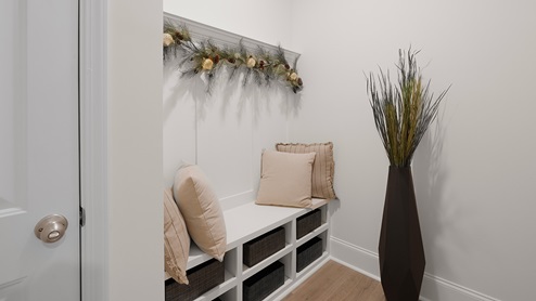 Mudroom space with built in storage.