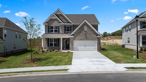 Exterior of model home with brick siding.
