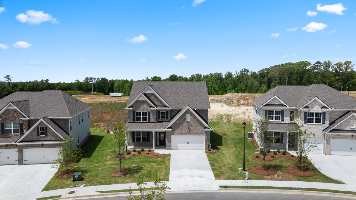 Exterior of the Bellview Plan by D.R. Horton in Butner Estates South Fulton, GA showcasing New Construction Home with modern curb appeal