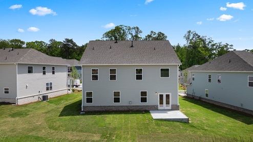 Exterior of model home with brick siding.