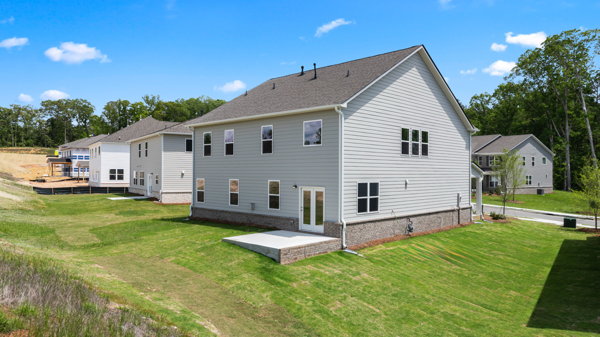 Exterior of the Bellview Plan by D.R. Horton in Butner Estates South Fulton, GA showcasing New Construction Home with modern curb appeal