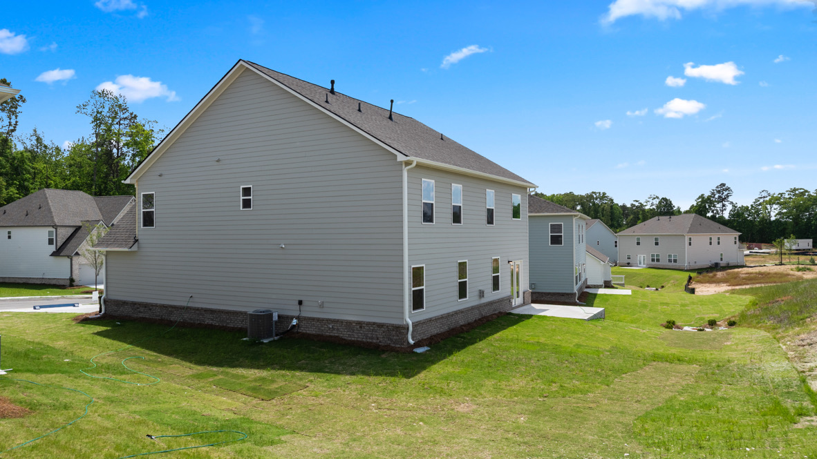 Exterior of the Bellview Plan by D.R. Horton in Butner Estates South Fulton, GA showcasing New Construction Home with modern curb appeal