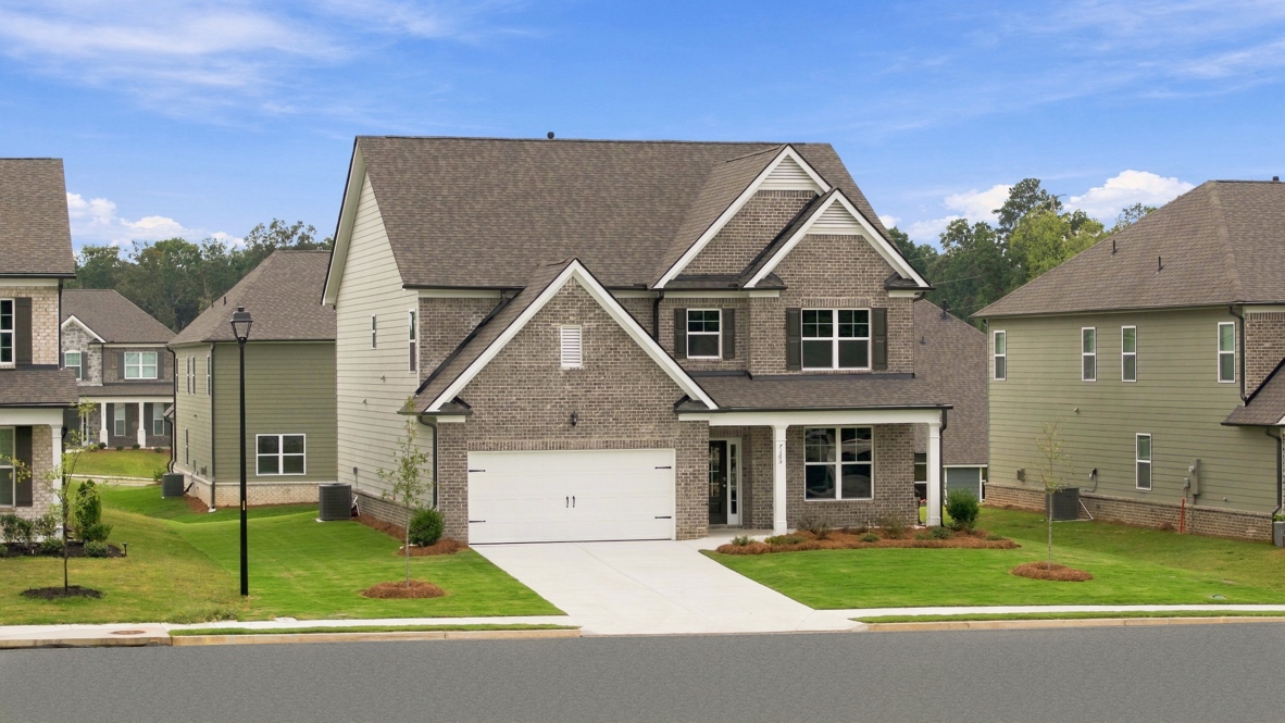 Front elevation of the Bellview Plan by D.R. Horton in Butner Estates South Fulton, GA showcasing New Construction Home with modern curb appeal