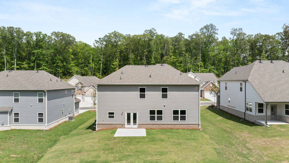 Exterior view of back yard and homes