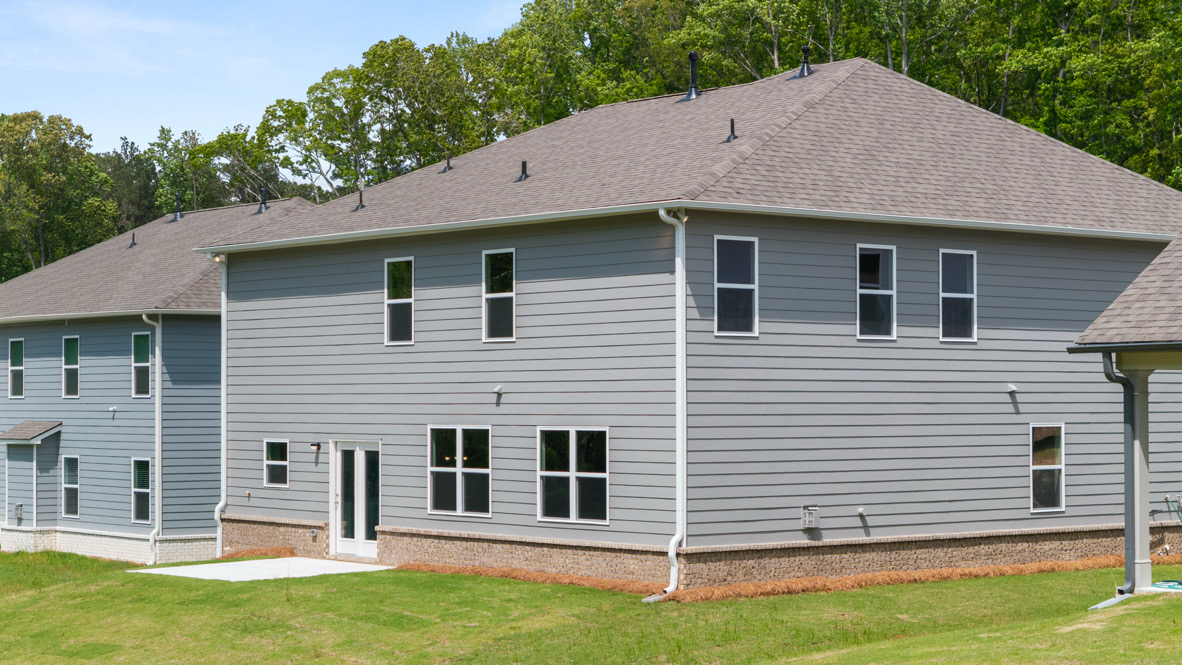 Exterior view of back yard and home