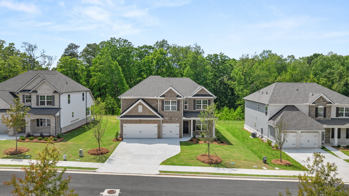 Exterior two-story homes with stone detailing