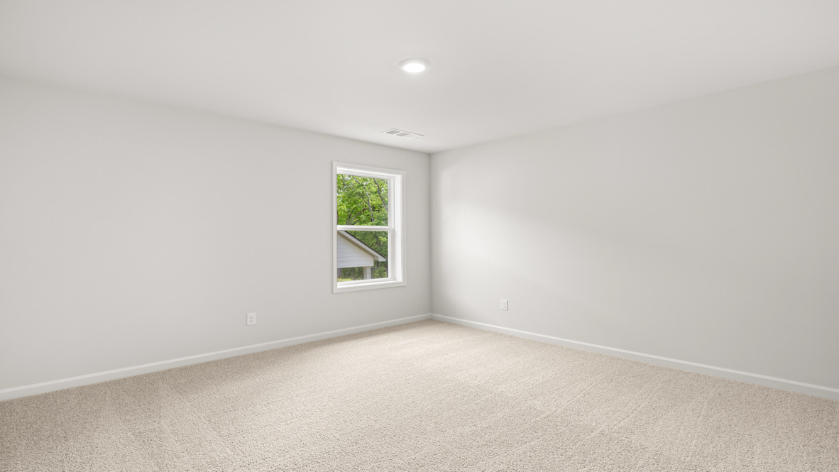 Loft + Secondary Bedroom Open layout upstairs features loft flowing into secondary bedroom, ideal for multipurpose use