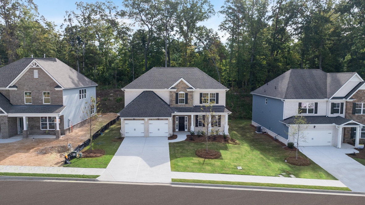 Exterior two-story home with stone detailing