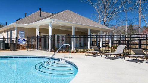 thompson ridge community amenity pool with large pond
