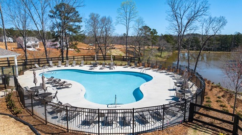 thompson ridge community amenity pool with large pond