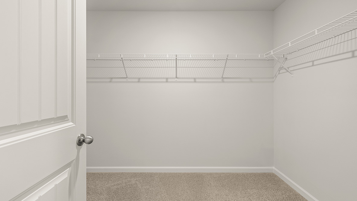Interior primary walk-in closet