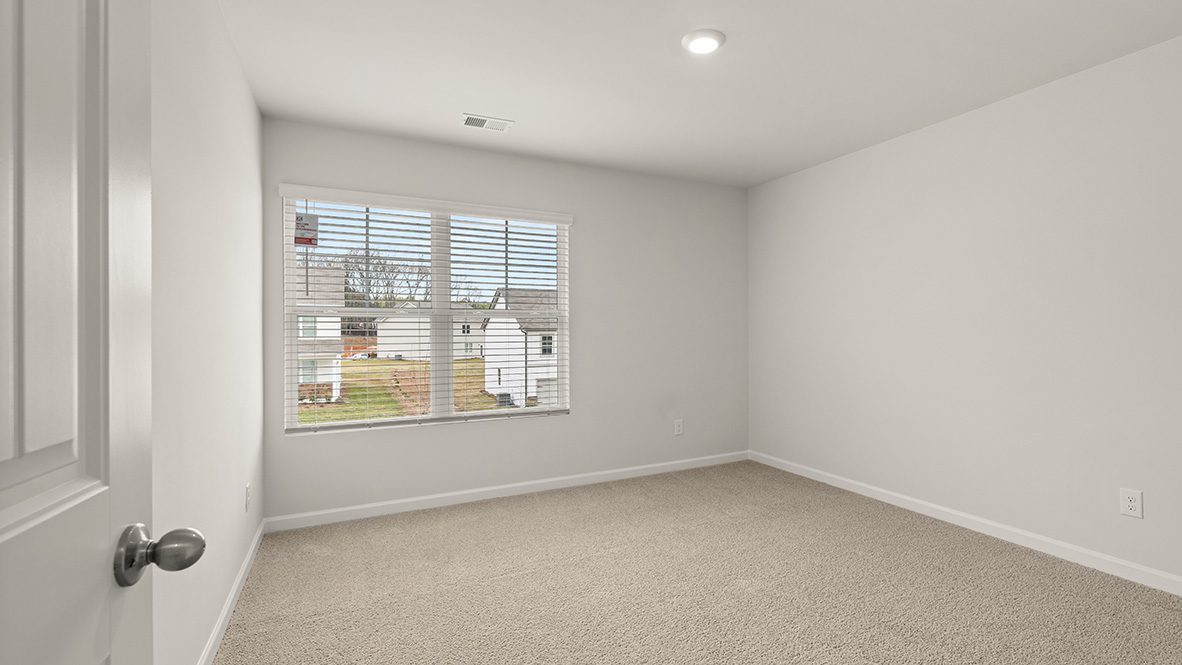 Interior bedroom with large window