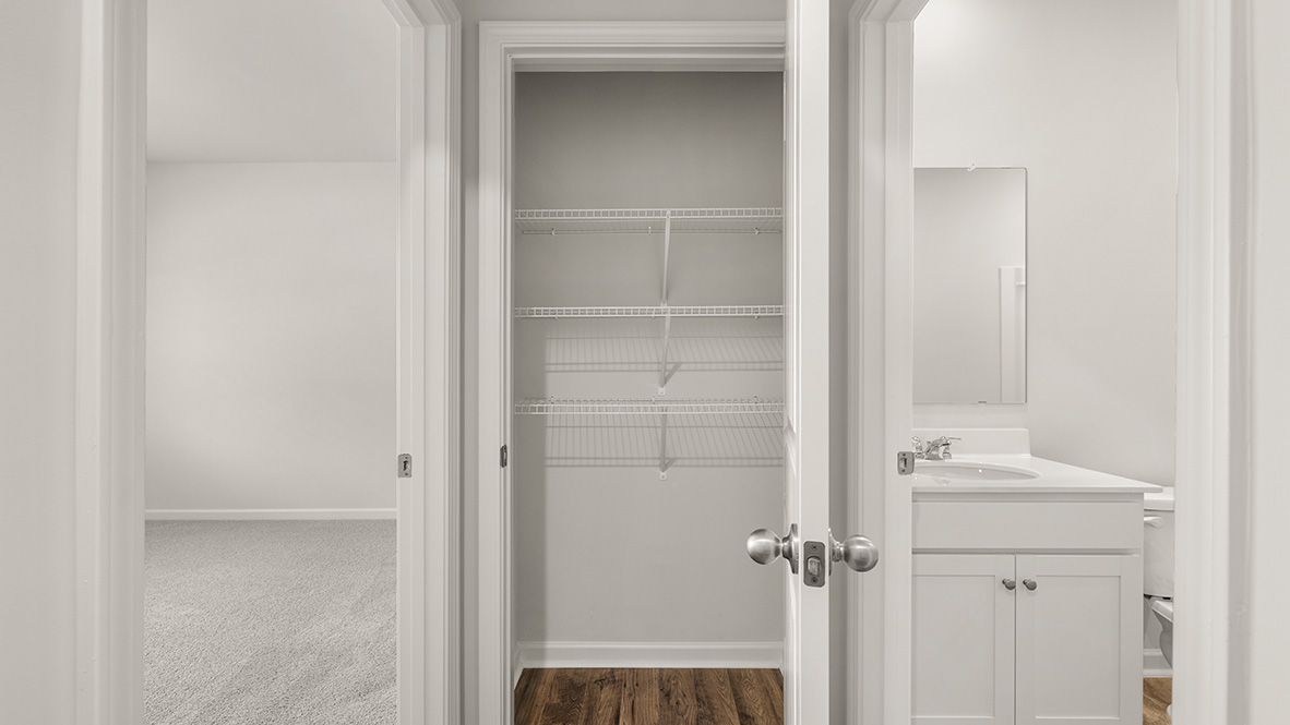 Interior hallway with hall closet