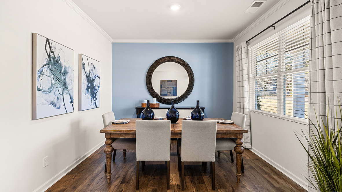 Interior flex room with accent wall and large window
