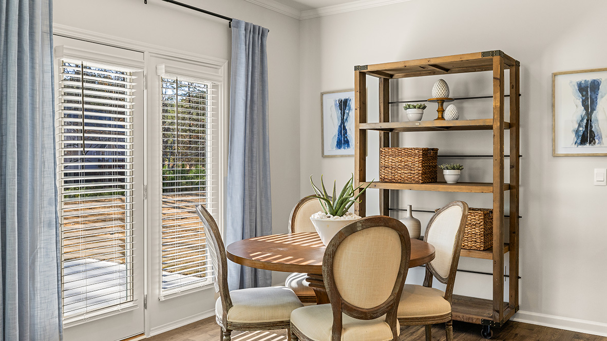 Interior dining area next to back patio doors