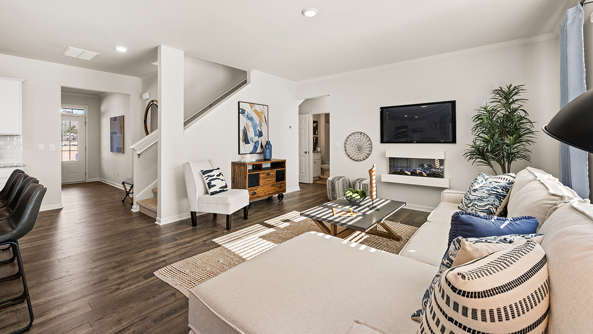 Interior living area with fire place and large window