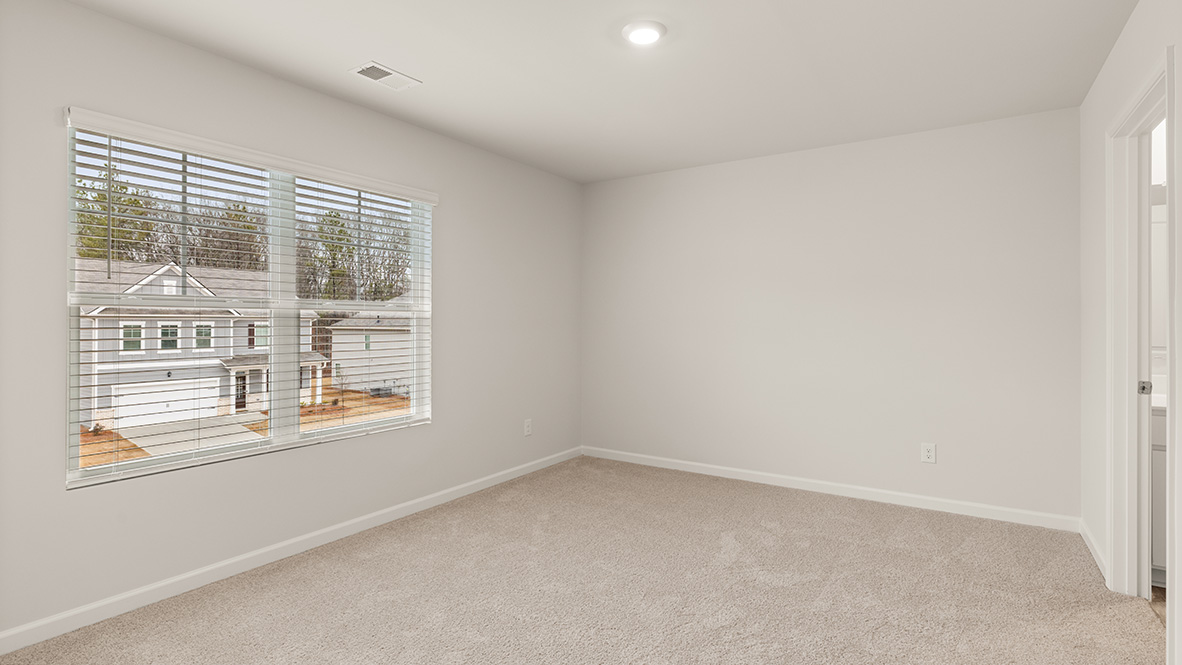 secondary bedroom with large window