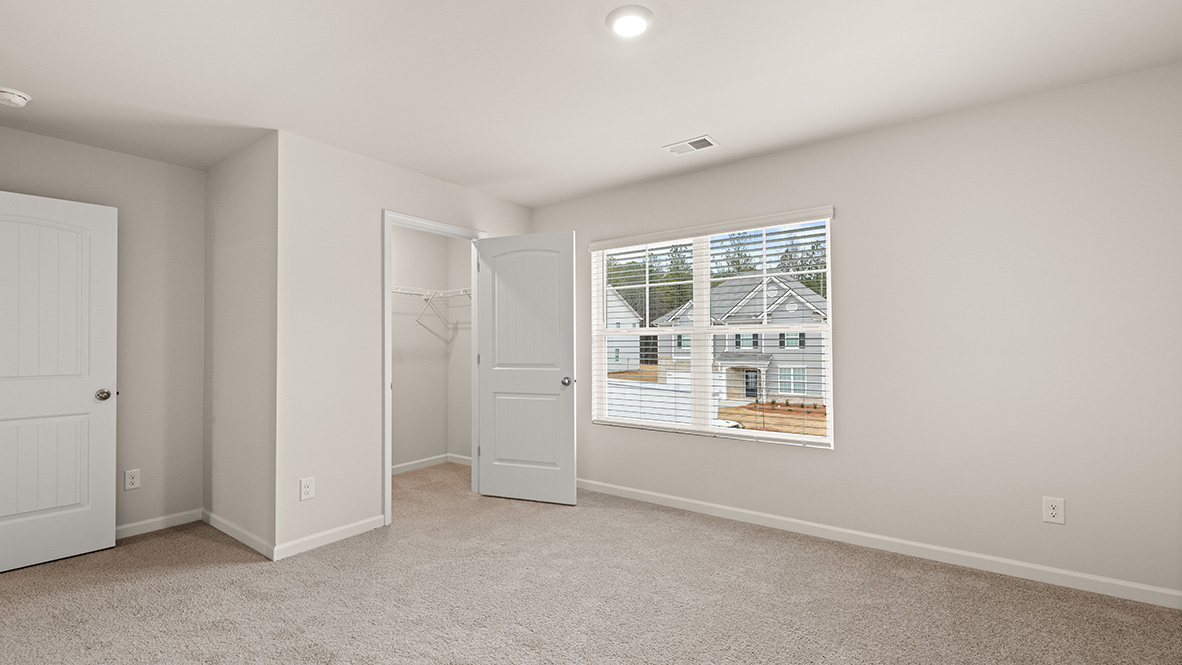 secondary bedroom with large window