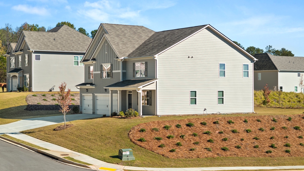 Exterior of the Mansfield floorplan at Thompson Ridge in Dallas, GA