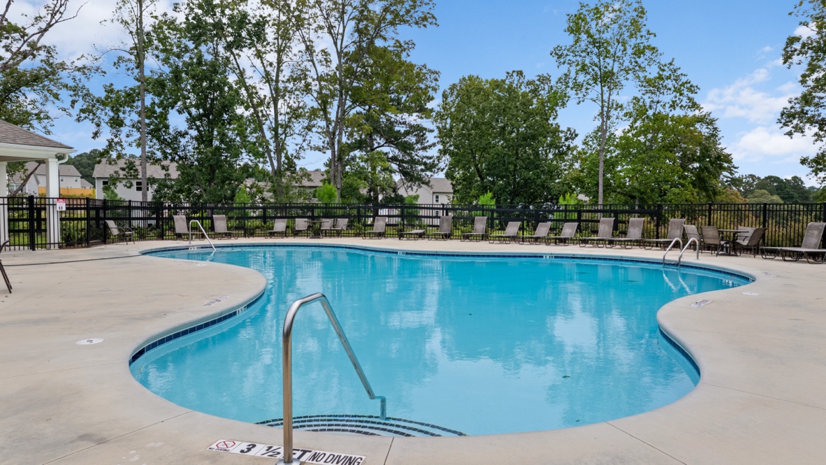 thompson ridge community amenity pool with large pond