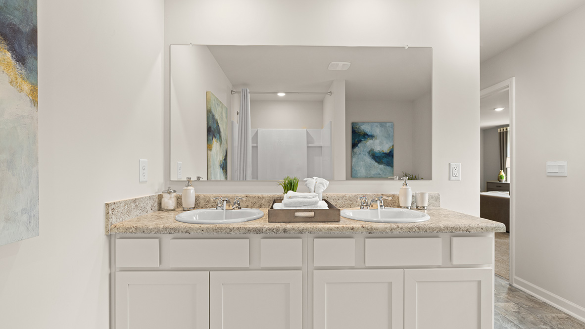 Interior primary bathroom with double sink