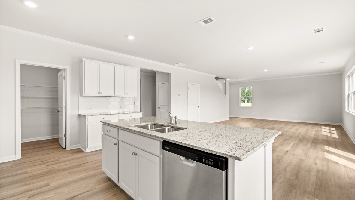 Interior kitchen with center island open to living area