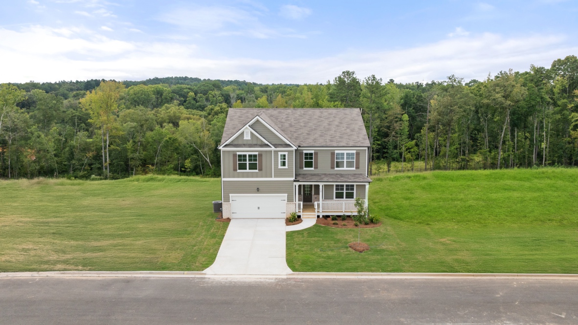 Exterior two-story home with stone detailing