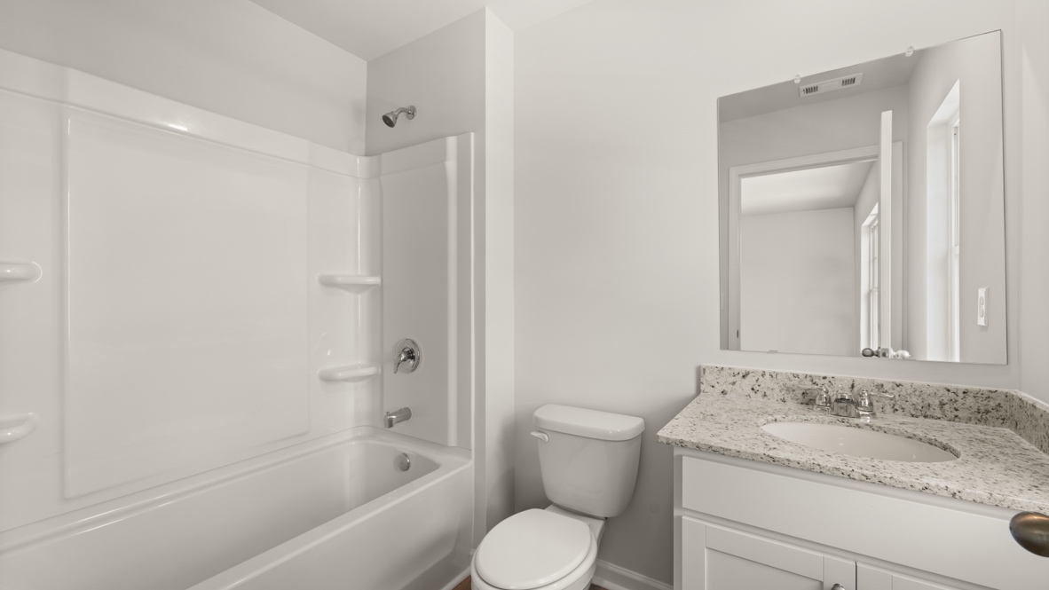 Interior bathroom with sink and full-sized shower