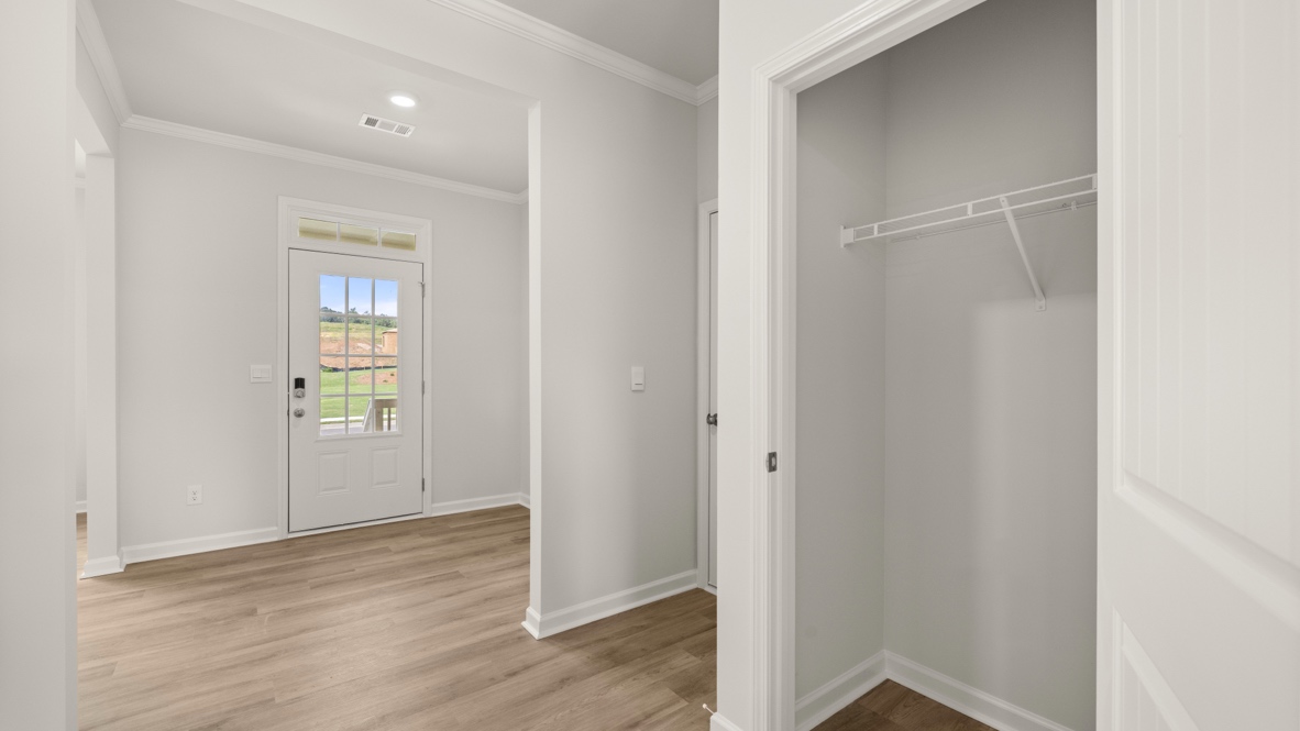 Interior hallway with hall closet