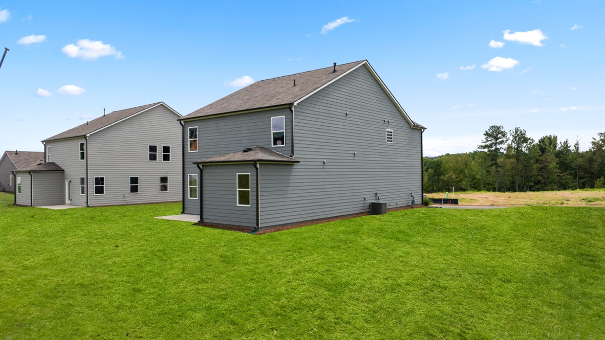 Exterior view of back yard and home