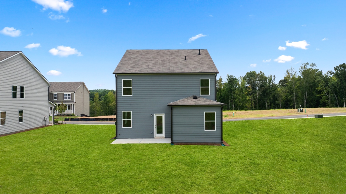 Exterior view of back yard and home