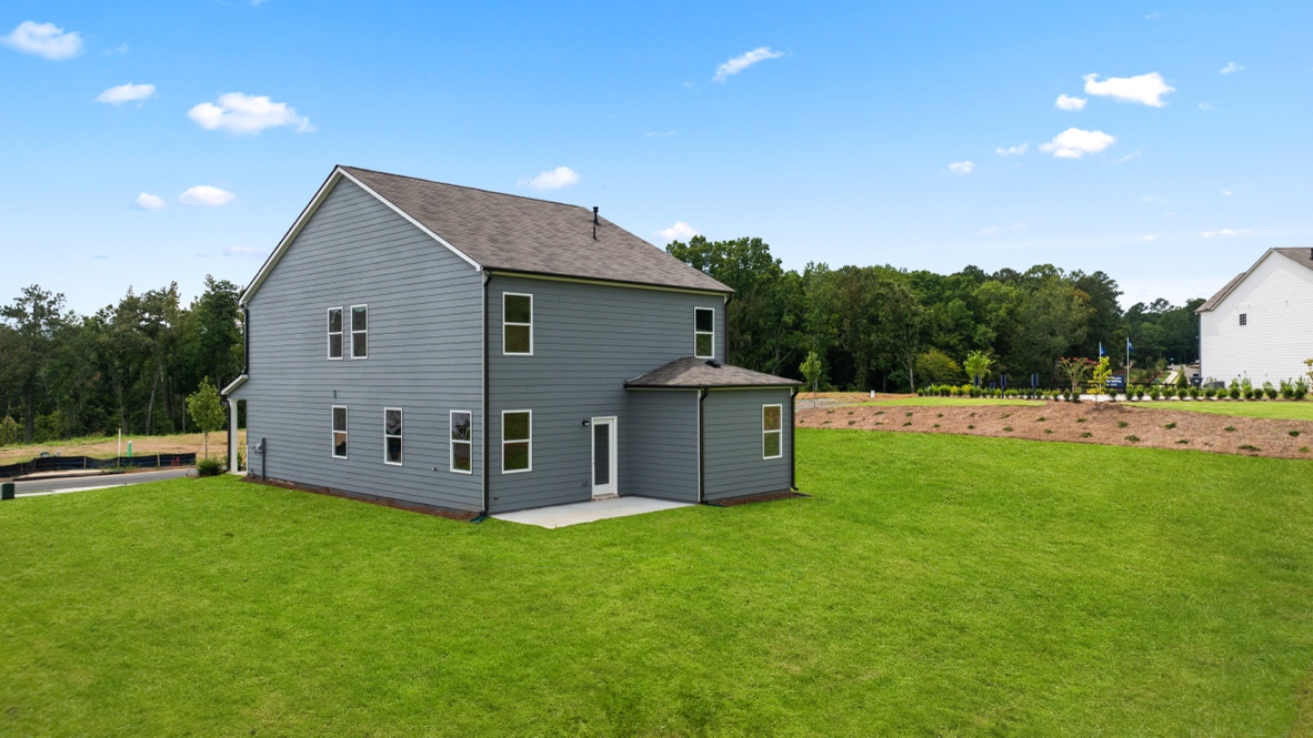 Exterior view of back yard and home