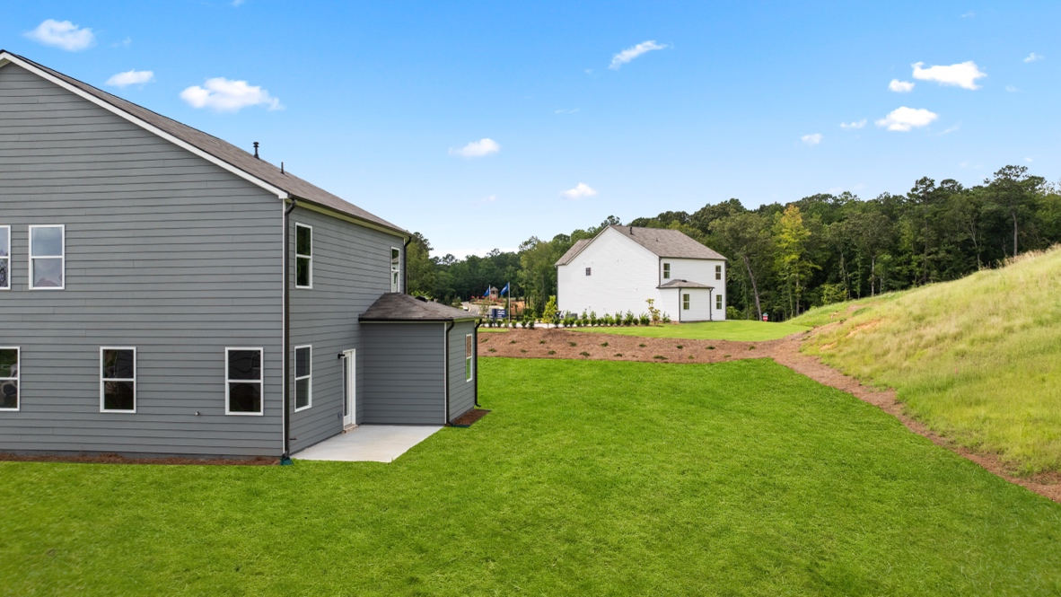 Exterior view of back yard and home