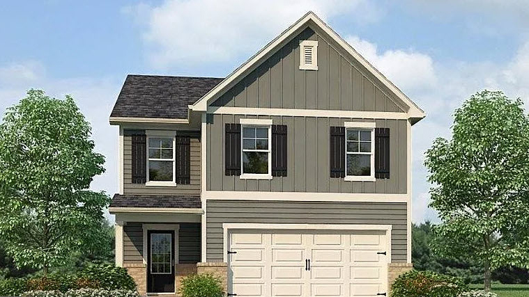 Exterior two-story home with cladding and stone detailing