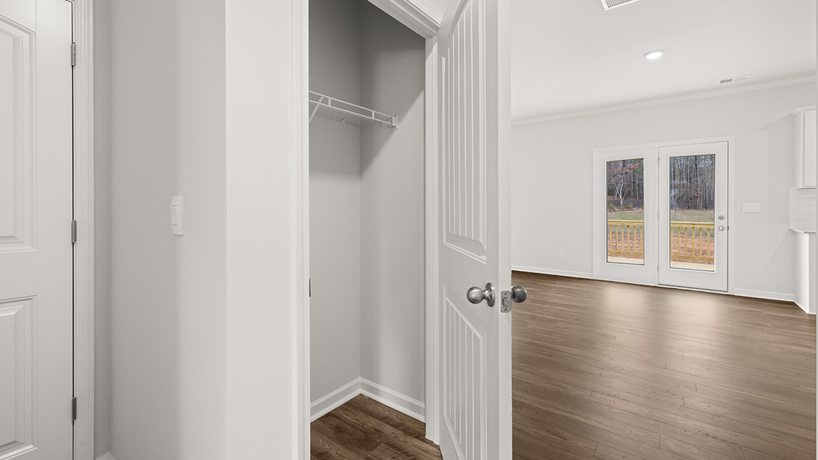 Interior hallway with hall closet