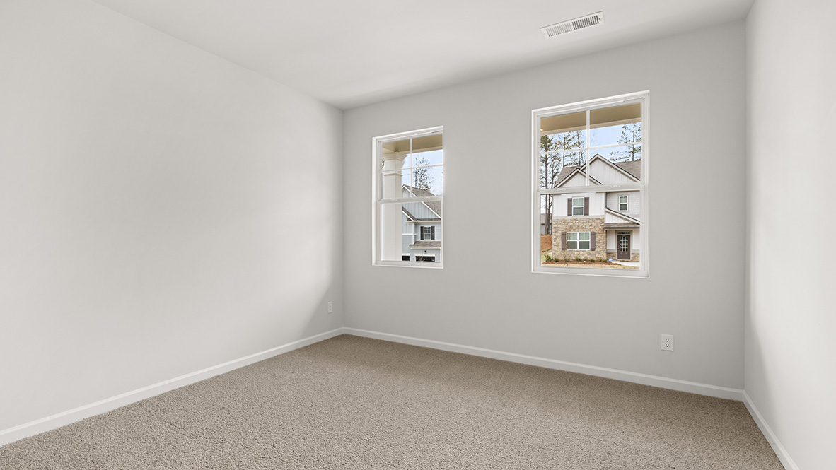Interior bedroom with windows