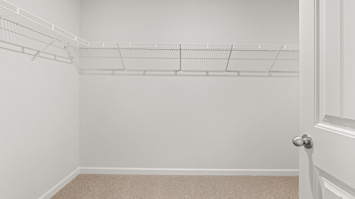 Interior primary walk-in closet