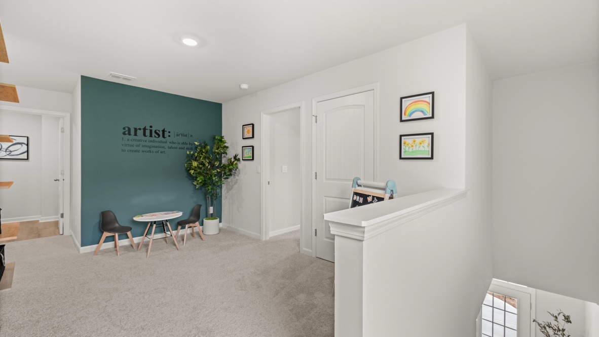 Interior upstairs loft area open to staircase