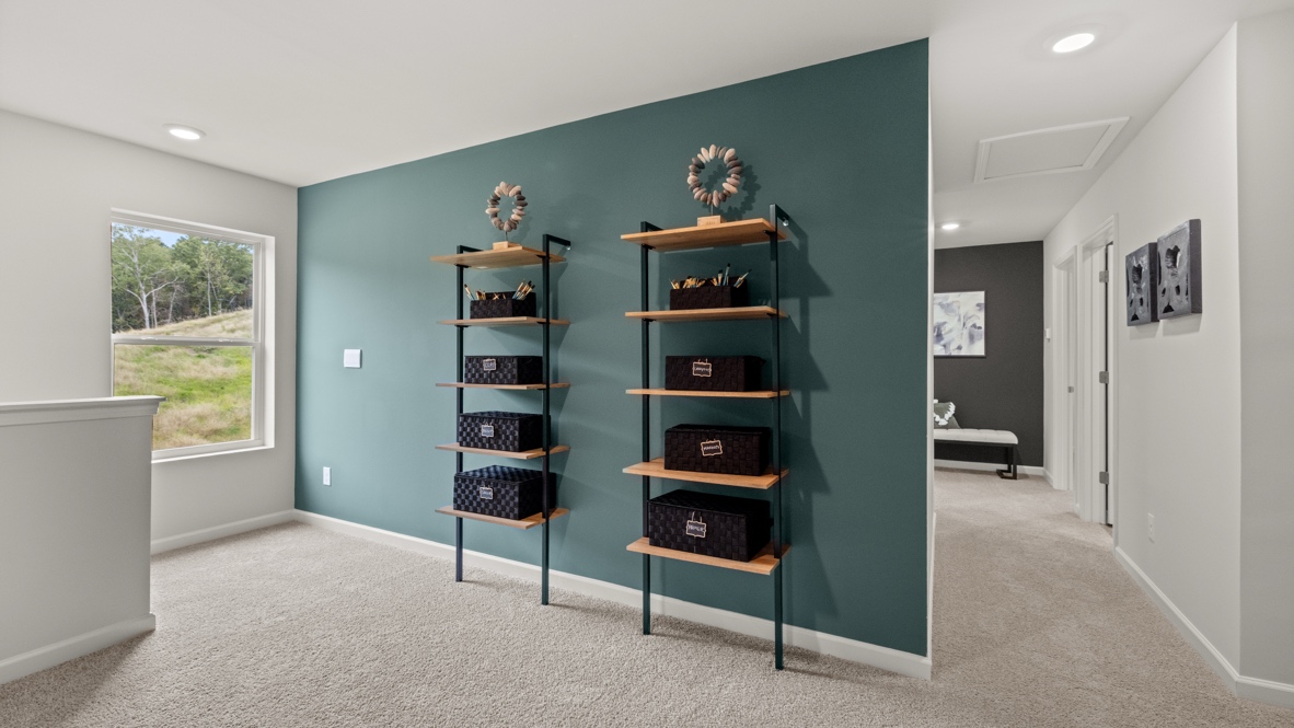 Interior upstairs loft area open to staircase