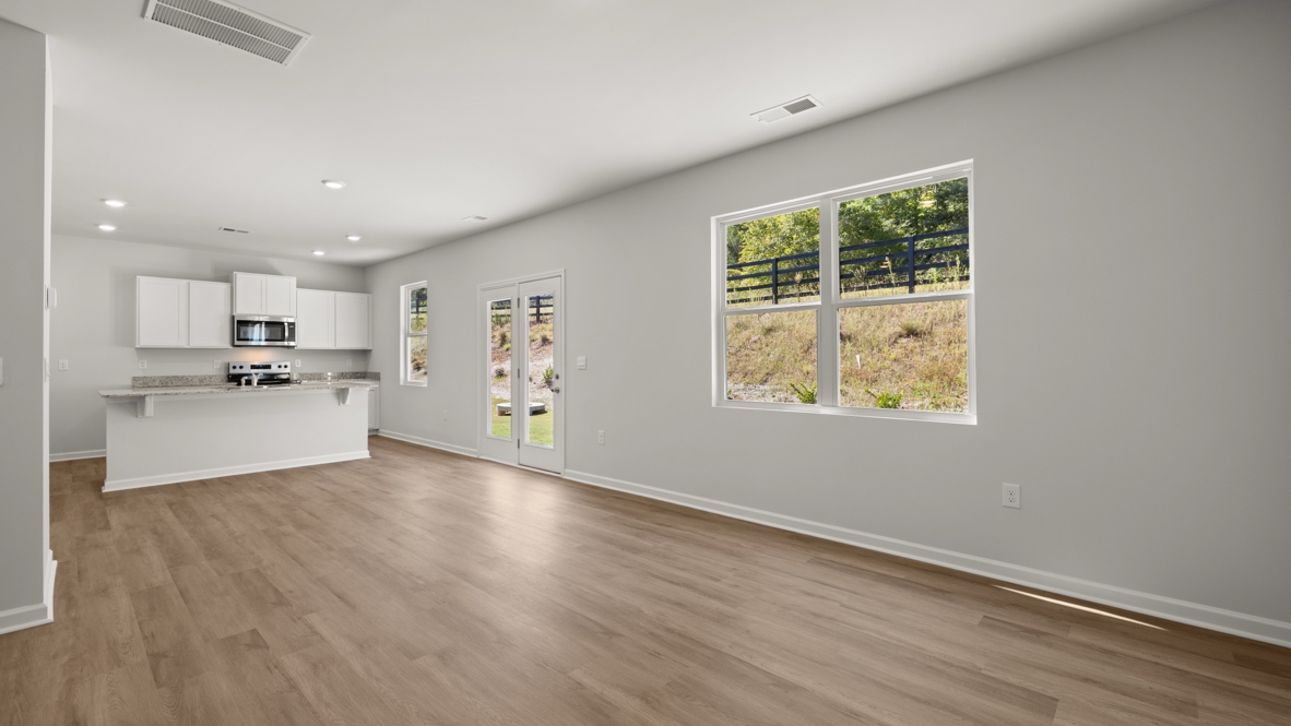 Interior living area open to kitchen with center island