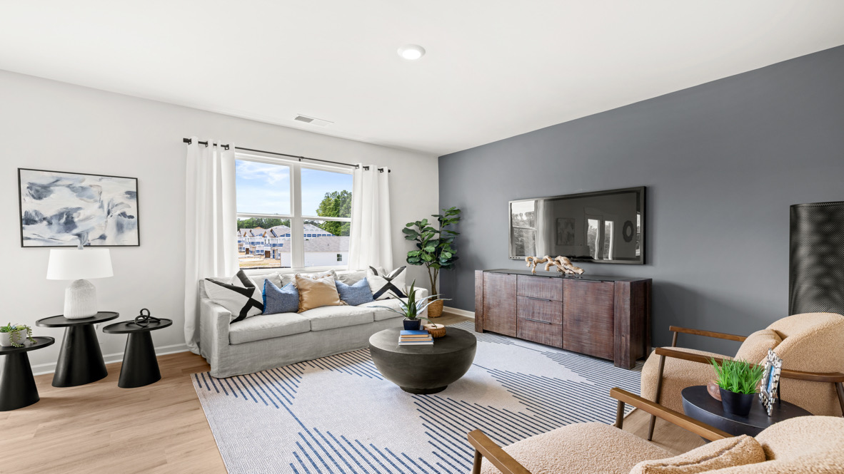 Belhaven Plan open concept living room with accent wall