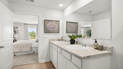 two story model home primary bathroom