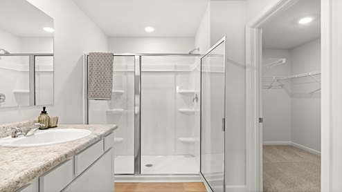 two story model home primary bathroom