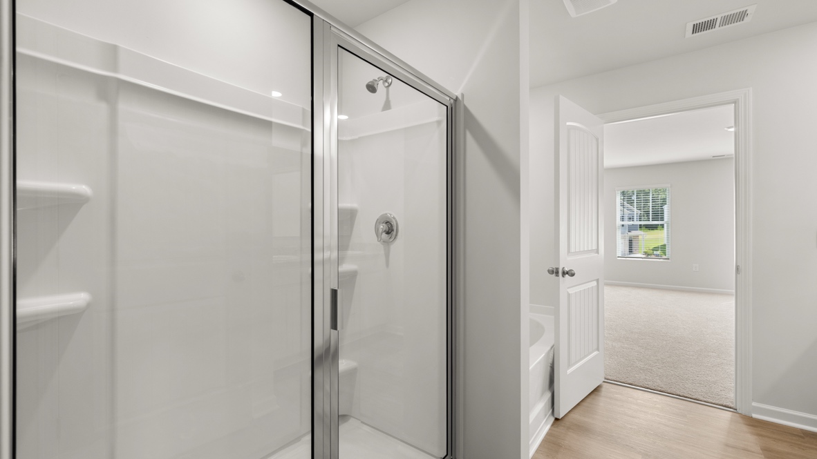 Interior primary bathroom with shower