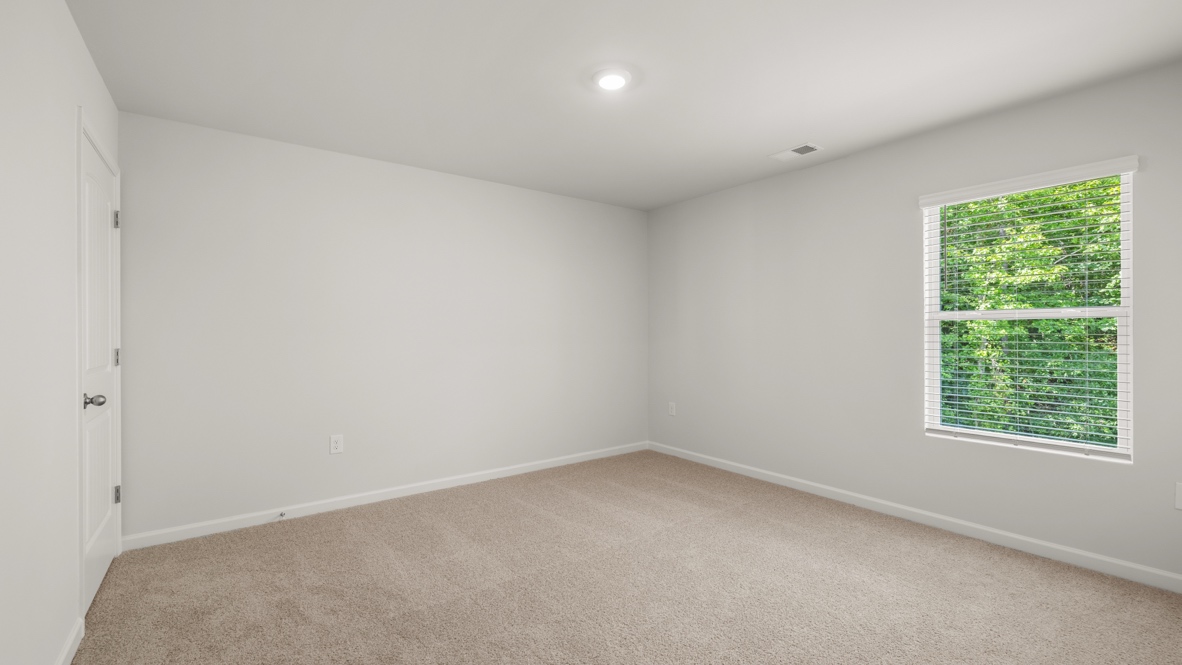 Interior bedroom with large window